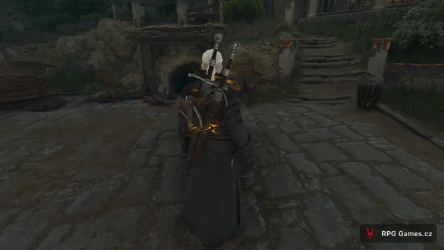 Geralt s aktivním Quenem a runovým kruhem na dlažbě v Remasteru